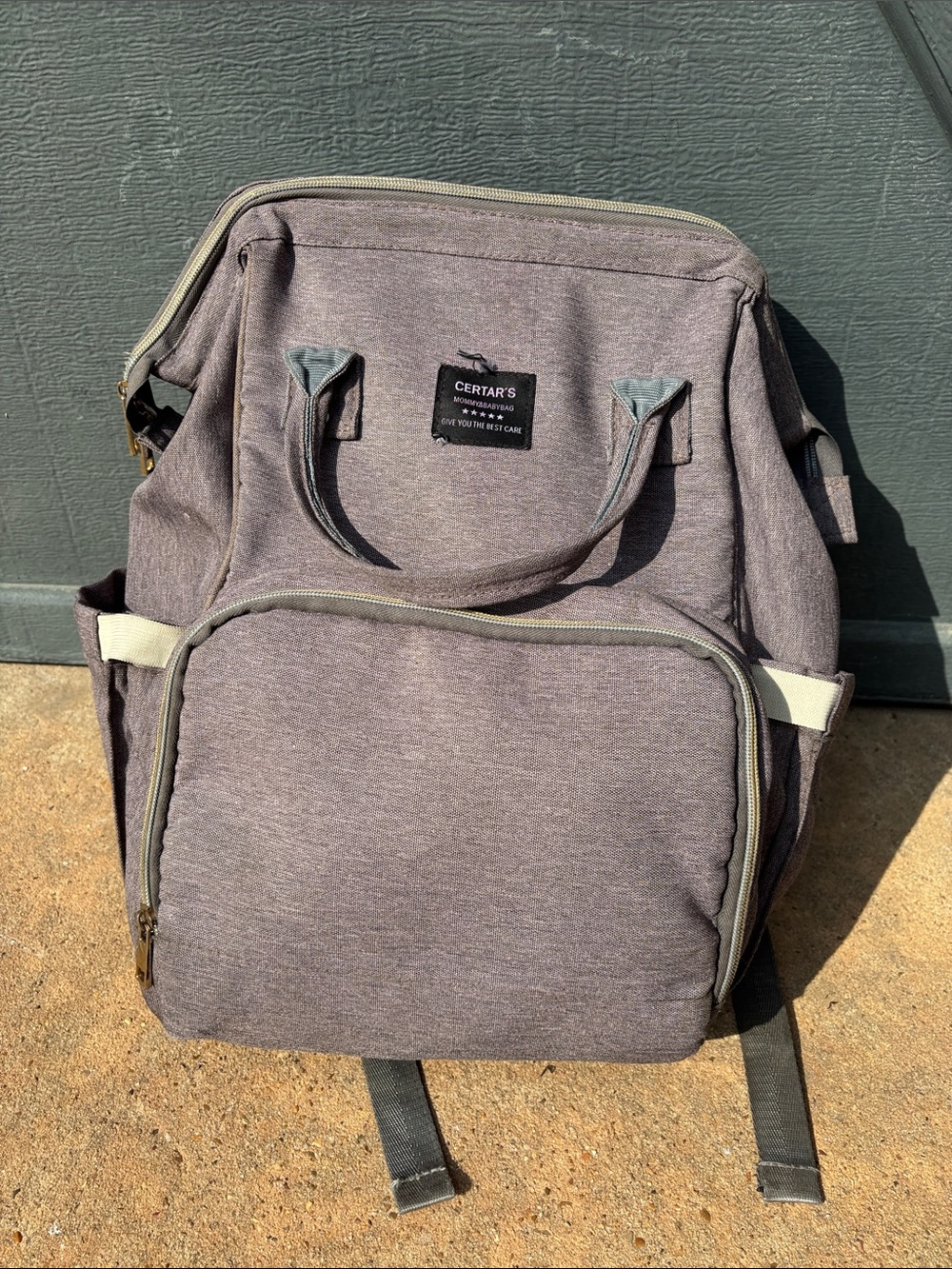 Large diaper bag. Fair condition. Zipper broken one way but other zipper works.